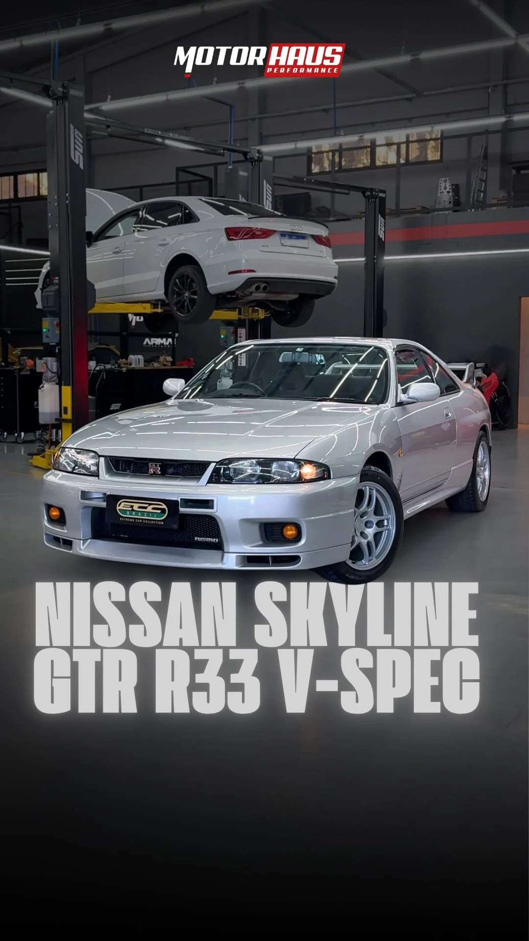 Nissan Skyline GT-R R33 V-Spec prata dentro da MotorHaus, após revisão informada na publicação.